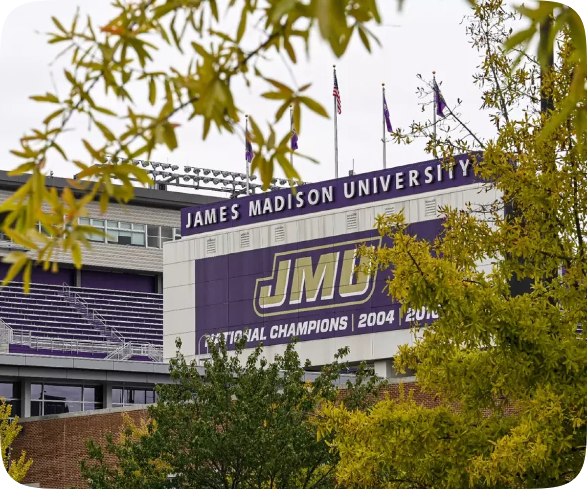 JMU football alumni community building careers and mentoring at a JMU football alumni event