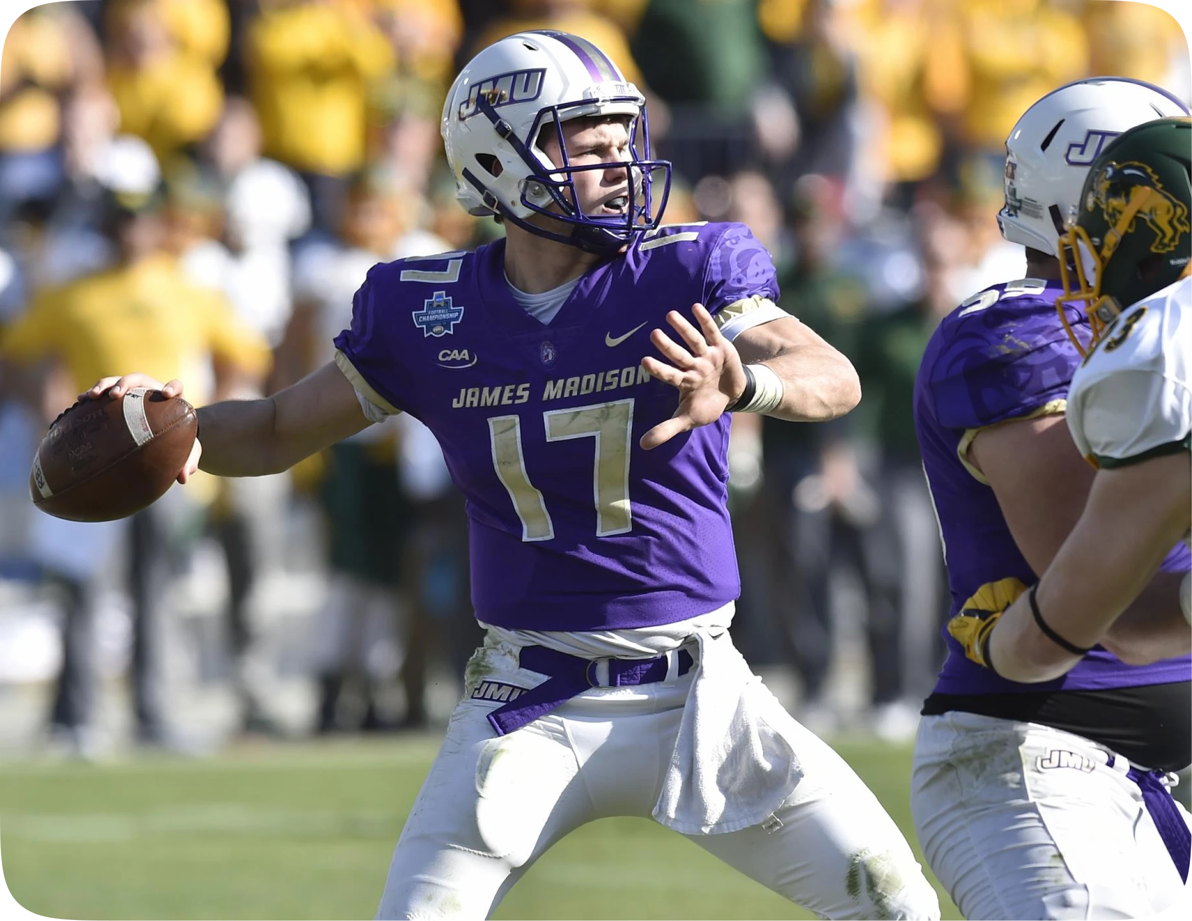JMU football alumni community built on brotherhood and driven by legacy at a JMU football game