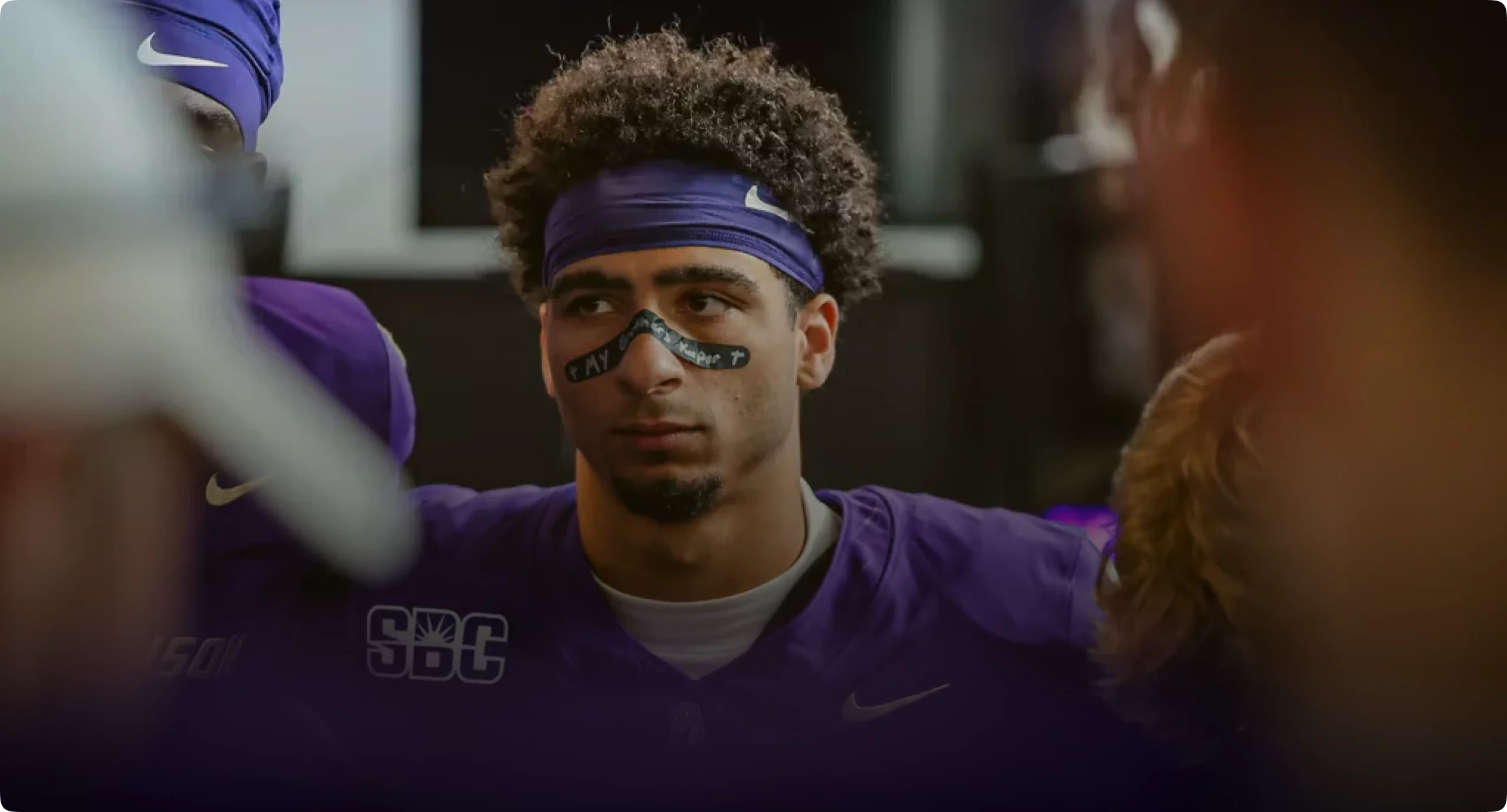 Mike Battle of the JMU football alumni community and former head coach at a game